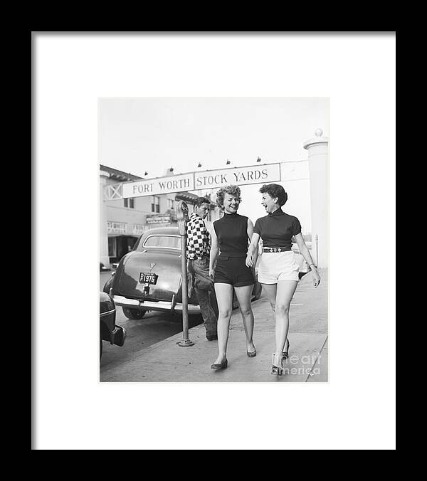 People Framed Print featuring the photograph Women In Shorts Draw An Admiring Whistle by Bettmann