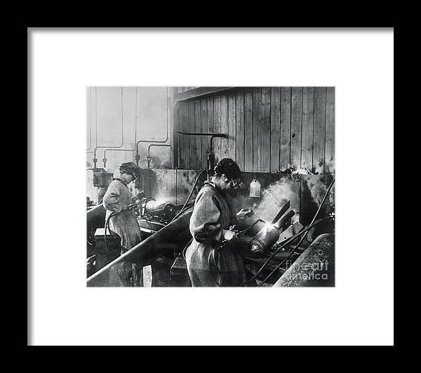 People Framed Print featuring the photograph Women Working In War Factory by Bettmann