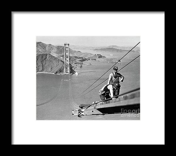 Civil Engineering Framed Print featuring the photograph Worker Constructing A Catwalk by Bettmann