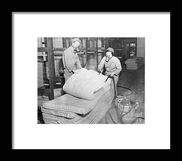 People Framed Print featuring the photograph Workers Disinfecting Mattresses by Bettmann