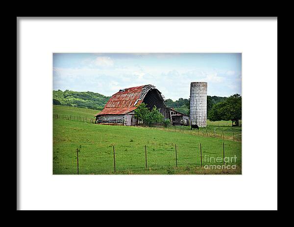 Years Of Wear But Still Standing Framed Print featuring the photograph Years Of Wear But Still Standing by Kathy M Krause