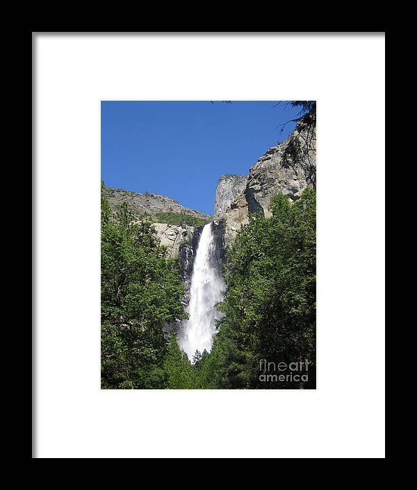 Yosemite Framed Print featuring the photograph Yosemite National Park Bridal Veil Falls Water Fall Blast on a Blue Sky Day by John Shiron