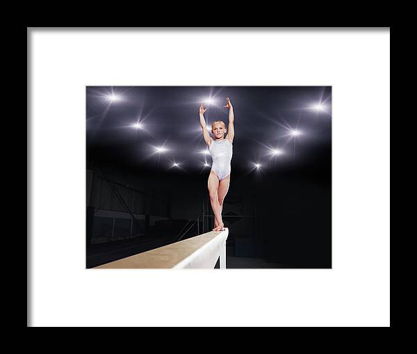 Human Arm Framed Print featuring the photograph Young Female Gymnast Performing On by Robert Decelis Ltd