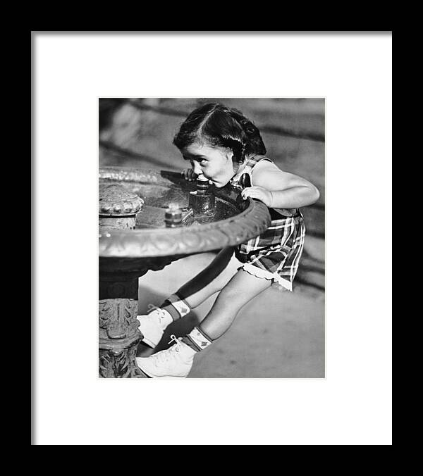 Child Framed Print featuring the photograph Young Girl Drinking From Water Fountain by George Marks
