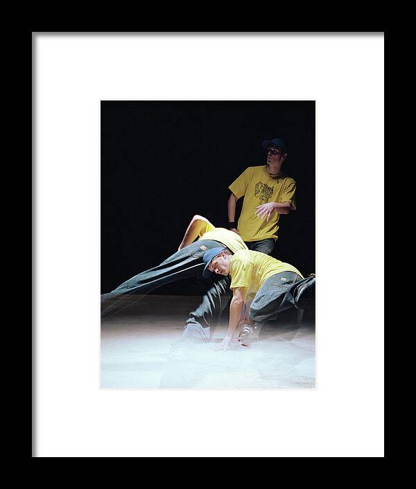 Baseball Cap Framed Print featuring the photograph Young Man Breakdancing Long Exposure by Ryan Mcvay