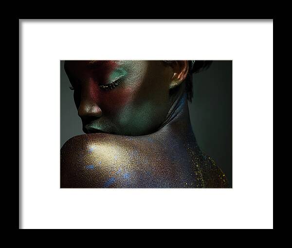 Shadow Framed Print featuring the photograph Young Woman Covered In Metallic Make Up by Image Source