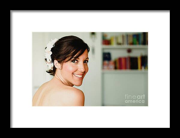 Adult Framed Print featuring the photograph Young woman from behind smiling by Joaquin Corbalan