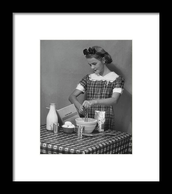 People Framed Print featuring the photograph Young Woman Preparing Food by George Marks