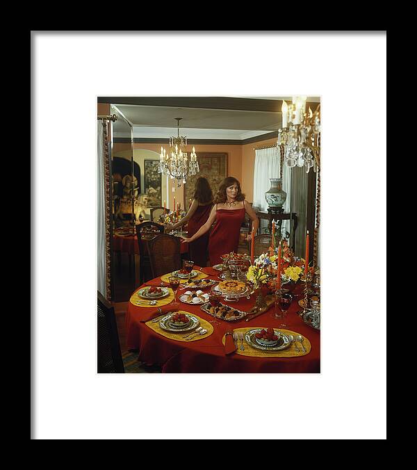 1979 Framed Print featuring the photograph Young Woman Standing Beside Dining by Tom Kelley Archive