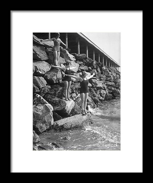 People Framed Print featuring the photograph Young Women Standing On Coastline by Bettmann