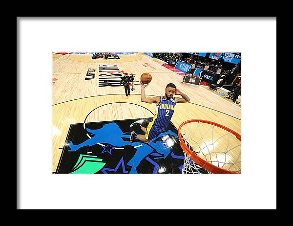 Cassius Stanley Framed Print featuring the photograph 2021 NBA All-Star - AT&T Slam Dunk Contest by Joe Murphy