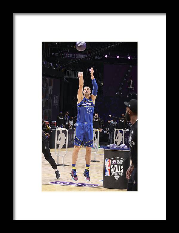 Nikola Vucevic Framed Print featuring the photograph 2021 NBA All-Star - Taco Bell Skills Challenge by Nathaniel S. Butler