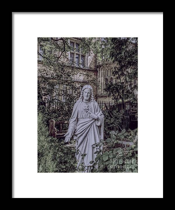Statue Framed Print featuring the photograph A statue of Christ in The Church of the Holy Name of Jesus, Oxford Road, Manchester, England. by Pics By Tony