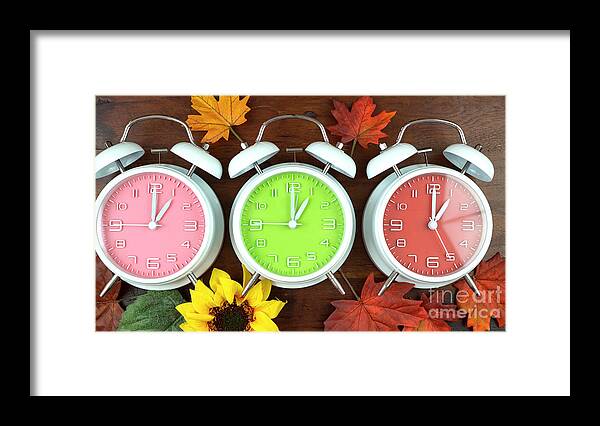 Alarm Framed Print featuring the photograph Autumn Fall Daylight Saving Time Clocks #1 by Milleflore Images