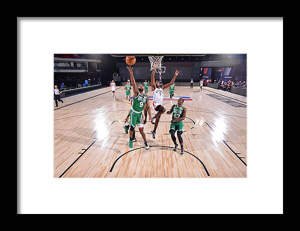 Brad Wanamaker Framed Print featuring the photograph Boston Celtics v Toronto Raptors by Bill Baptist