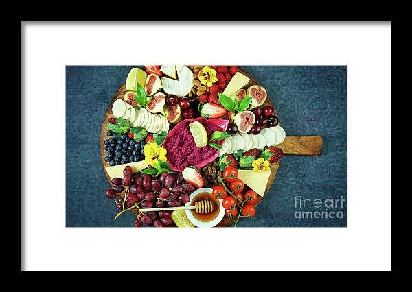 Food Framed Print featuring the photograph Cheese and fruit charcuterie dessert grazing platter on wooden board. #1 by Milleflore Images