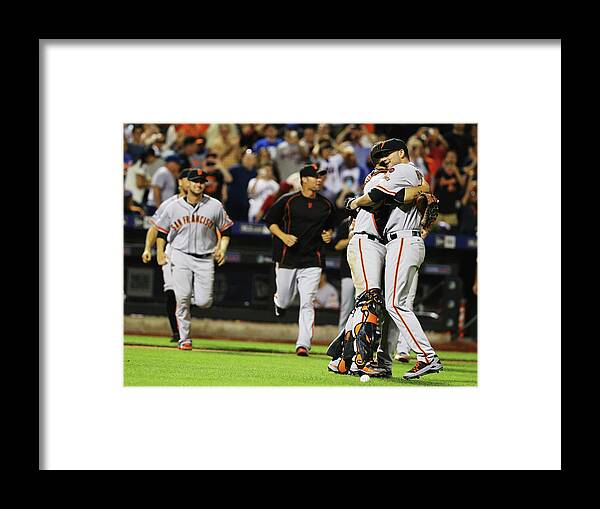 People Framed Print featuring the photograph Chris Heston and Buster Posey by Al Bello
