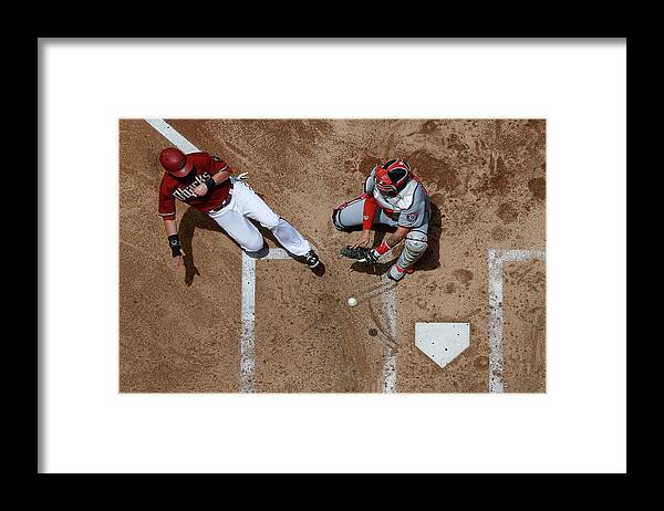 Second Inning Framed Print featuring the photograph Chris Owings by Christian Petersen