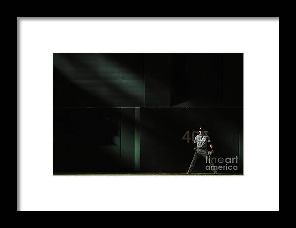 Ninth Inning Framed Print featuring the photograph Christian Yelich by Christian Petersen