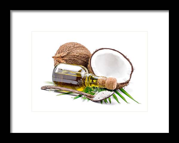 Alternative Medicine Framed Print featuring the photograph Coconut oil for alternative therapy #1 by Aedkais