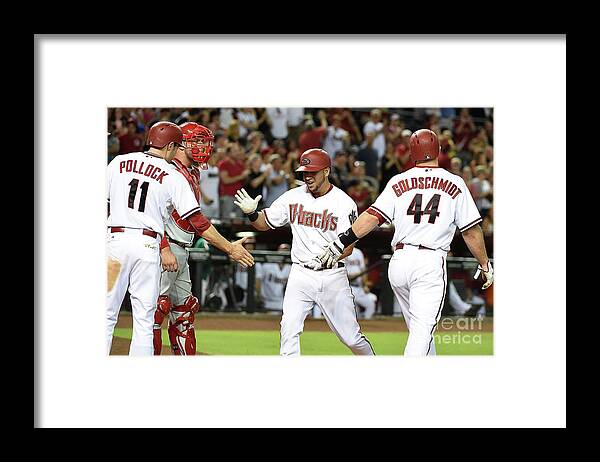 Second Inning Framed Print featuring the photograph David Peralta and Paul Goldschmidt by Norm Hall