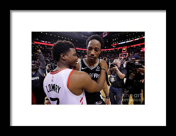 Nba Pro Basketball Framed Print featuring the photograph Demar Derozan and Kyle Lowry by Mark Blinch