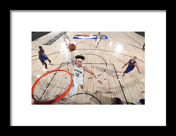 Nba Pro Basketball Framed Print featuring the photograph Denver Nuggets v New Orleans Pelicans by Joe Murphy