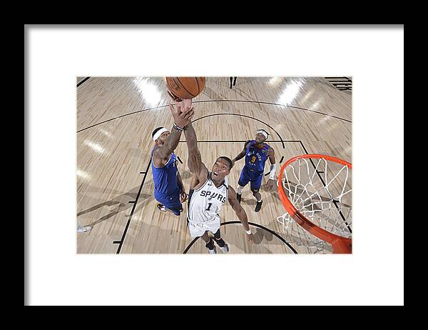 Lonnie Walker Iv Framed Print featuring the photograph Denver Nuggets v San Antonio Spurs #1 by David Dow