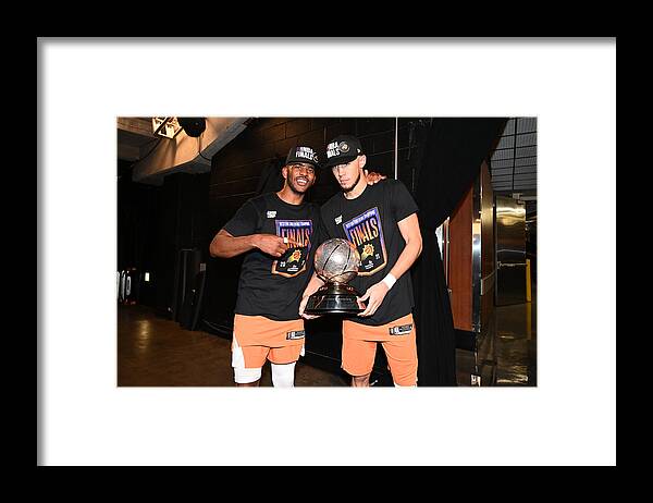 Chris Paul Framed Print featuring the photograph Devin Booker and Chris Paul by Adam Pantozzi