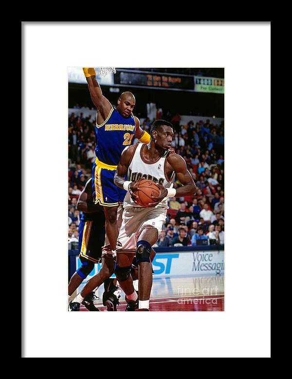 Mcnichols Sports Arena Framed Print featuring the photograph Dikembe Mutombo #1 by Nba Photos