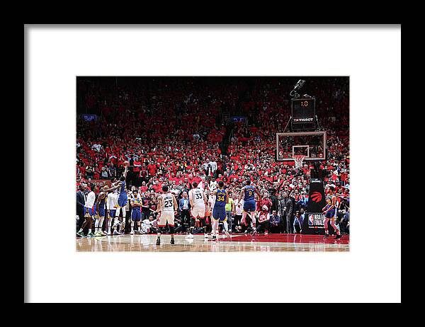 Draymond Green Framed Print featuring the photograph Draymond Green and Kyle Lowry by Nathaniel S. Butler