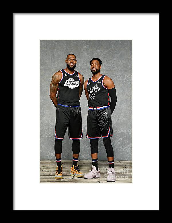 Nba Pro Basketball Framed Print featuring the photograph Dwyane Wade and Lebron James by Jesse D. Garrabrant