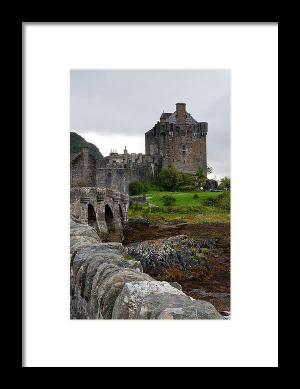 Scotland Framed Print featuring the photograph Eilean Donan Castle in the loch Alsh at the highlands of Scotlan by Michalakis Ppalis
