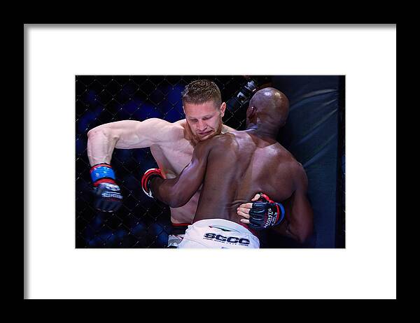 Sport Framed Print featuring the photograph FIGHT 19 FIGHT NIGHTS MMA: Vladimir Mineev v Xavier Foupa-Pokam by Oleg Nikishin
