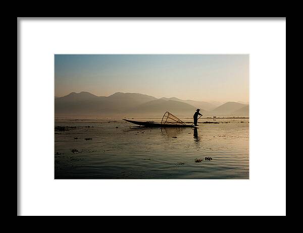 Fisherman Framed Print featuring the photograph Fisherman at Inle Lake by Arj Munoz