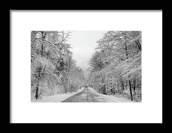 Back Road Framed Print featuring the photograph Traveling Through the Fresh Snow by David T Wilkinson