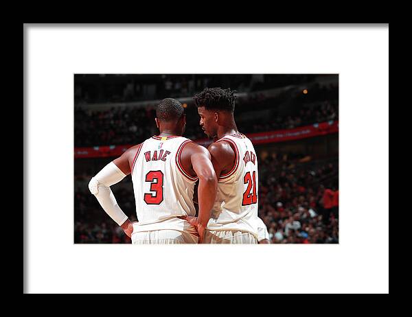 Nba Pro Basketball Framed Print featuring the photograph Jimmy Butler and Dwyane Wade by Jeff Haynes