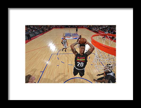 Nba Pro Basketball Framed Print featuring the photograph John Collins by David Dow