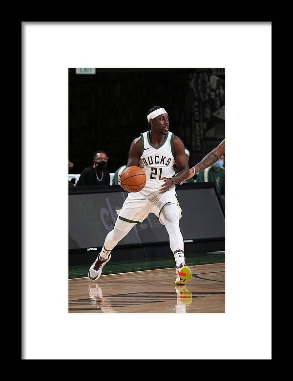 Nba Pro Basketball Framed Print featuring the photograph Jrue Holiday by Gary Dineen