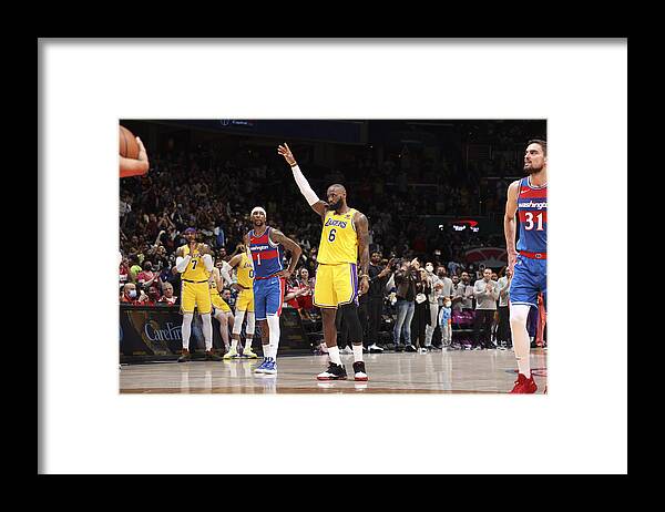 Nba Pro Basketball Framed Print featuring the photograph Karl Malone and Lebron James by Stephen Gosling