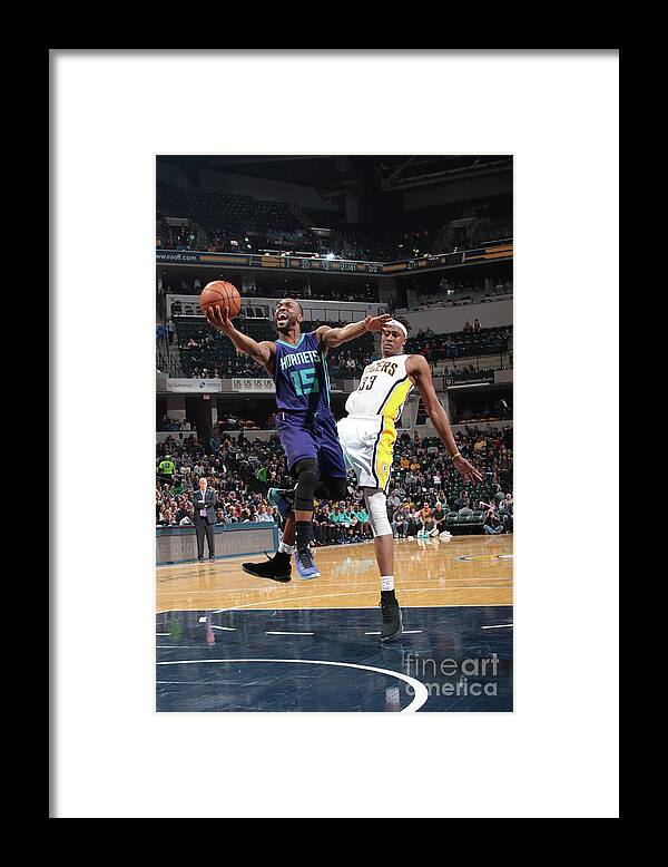 Kemba Walker Framed Print featuring the photograph Kemba Walker by Ron Hoskins