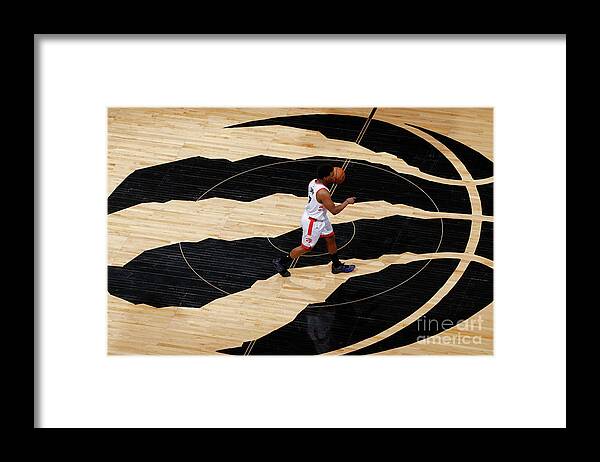Kyle Lowry Framed Print featuring the photograph Kyle Lowry by Mark Blinch