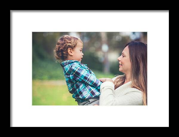 Toddler Framed Print featuring the photograph Mother son connection #1 by Layland Masuda