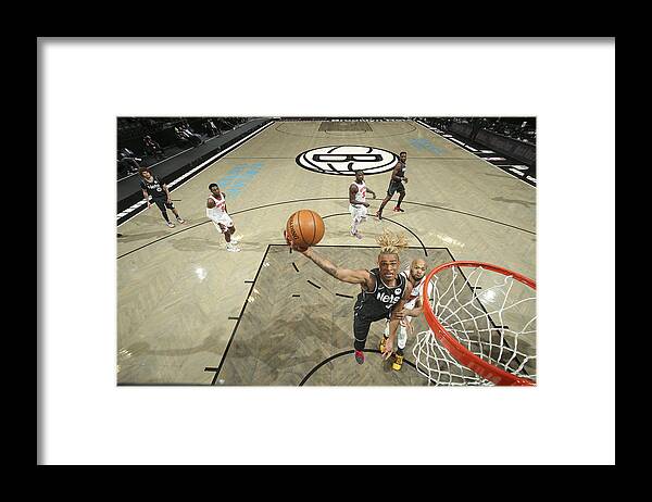 Nba Pro Basketball Framed Print featuring the photograph New York Knicks v Brooklyn Nets by Nathaniel S. Butler