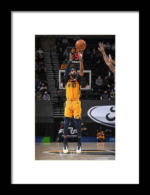 Mike Conley Framed Print featuring the photograph New York Knicks v Utah Jazz #1 by Garrett Ellwood