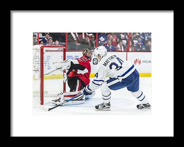 Scoring Framed Print featuring the photograph NHL: OCT 12 Maple Leafs at Senators #1 by Icon Sportswire