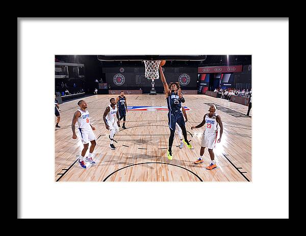 Wes Iwundu Framed Print featuring the photograph Orlando Magic v Los Angeles Clippers by Jesse D. Garrabrant