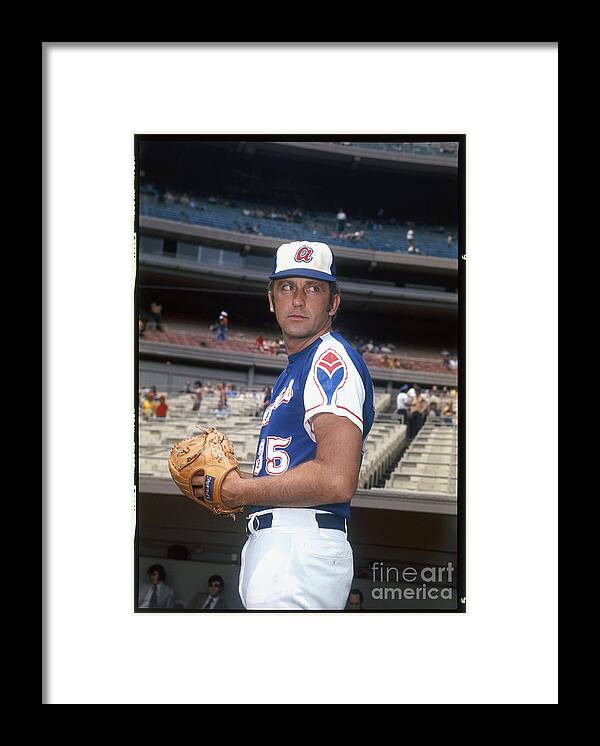 Baseball Pitcher Framed Print featuring the photograph Phil Niekro by Louis Requena