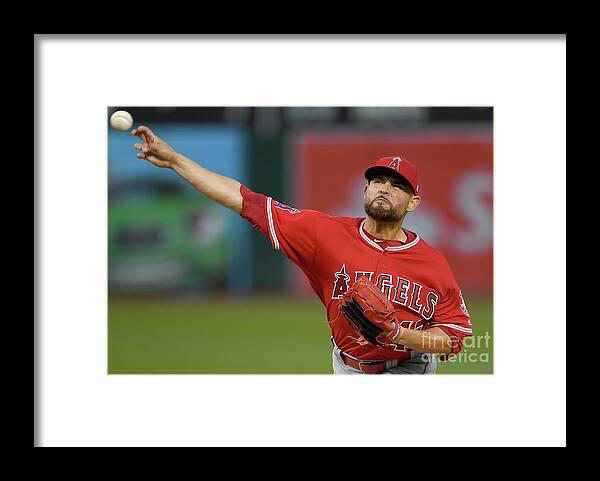 Three Quarter Length Framed Print featuring the photograph Ricky Nolasco #1 by Thearon W. Henderson