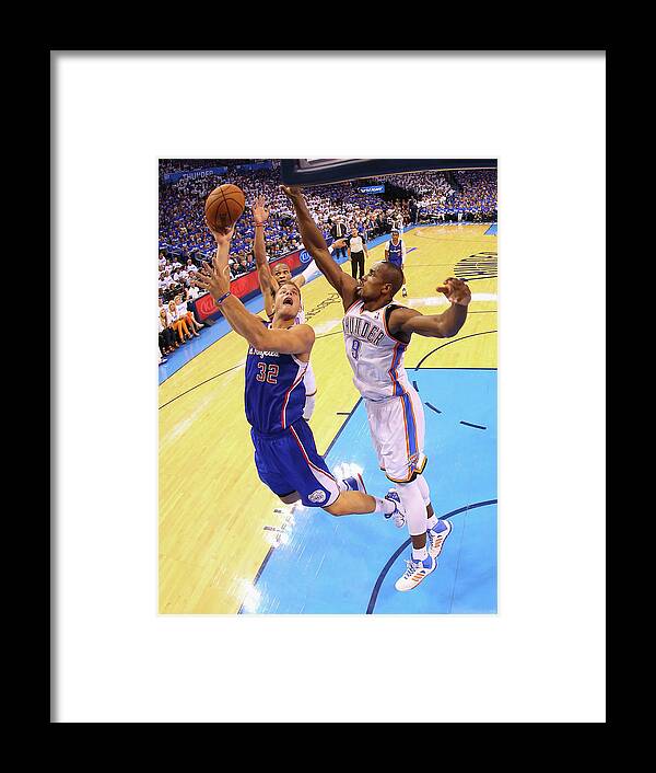 Playoffs Framed Print featuring the photograph Serge Ibaka and Blake Griffin by Ronald Martinez
